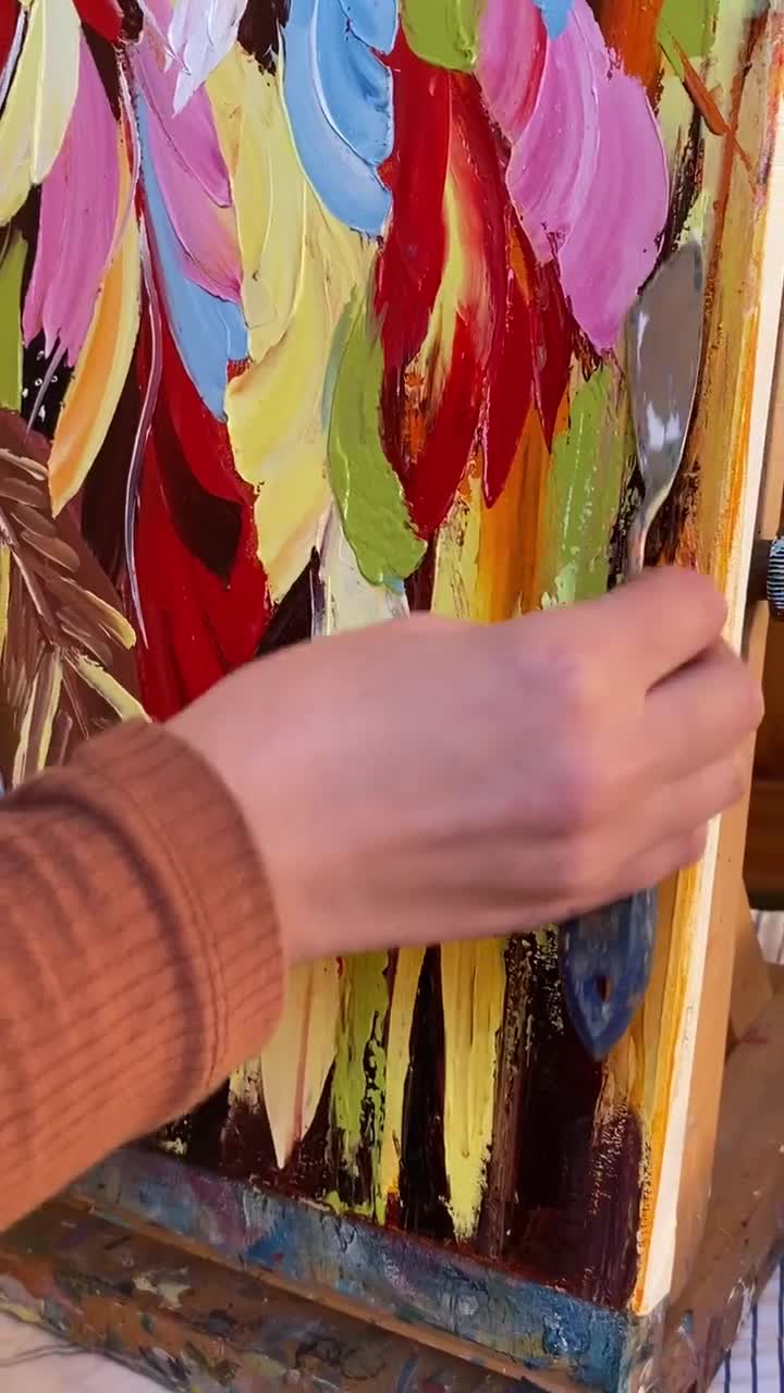 ネイティブアメリカンアート油絵 インディアンの羽根飾りをつけた