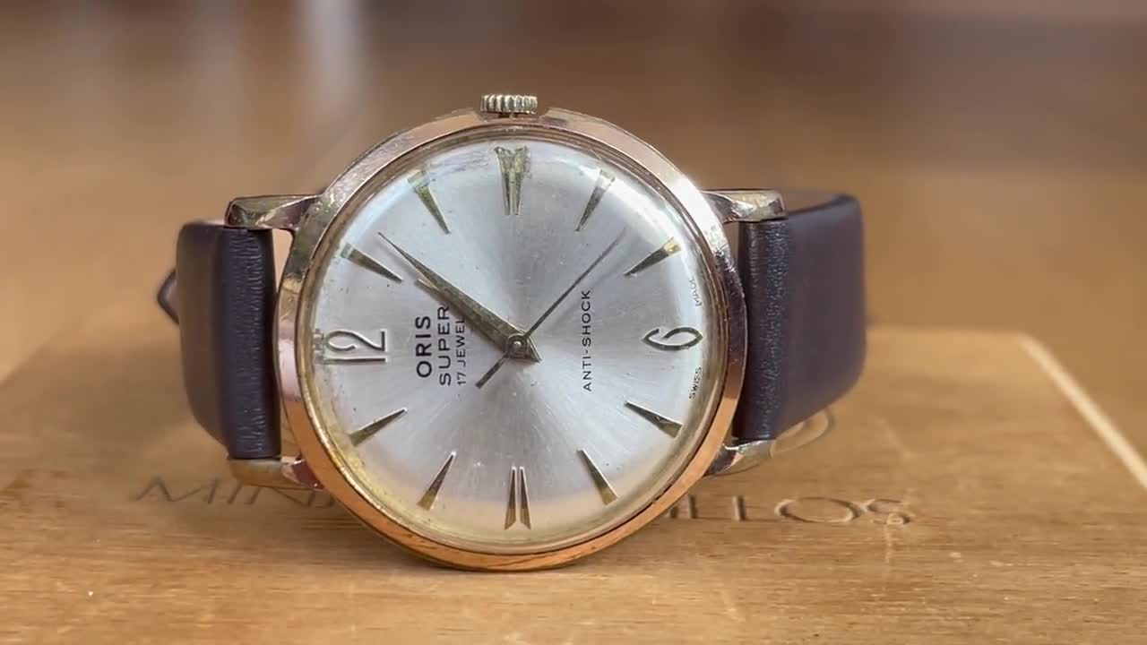 1960年代のスイス製ヴィンテージ機械式メンズ金メッキ腕時計オリス