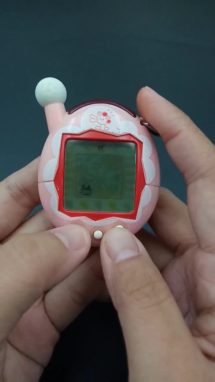SKU B833P9932 | Bandai Japanese Tamagotchi V4 Pink Connection