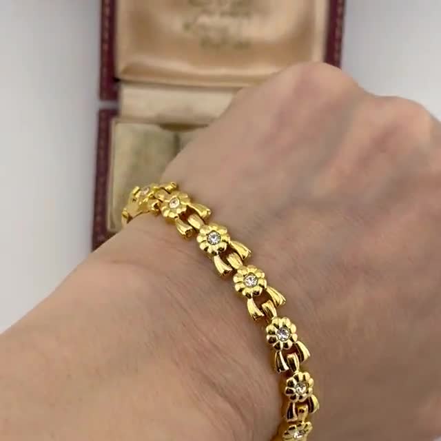 ヴィンテージ1980年代ゴールドフローラルブレスレット、クリア