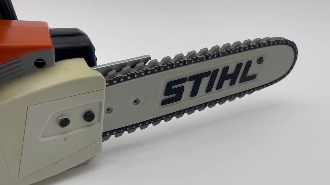 STIHL Brand Kids Toy Chainsaw With Rotating Chain and Sounds