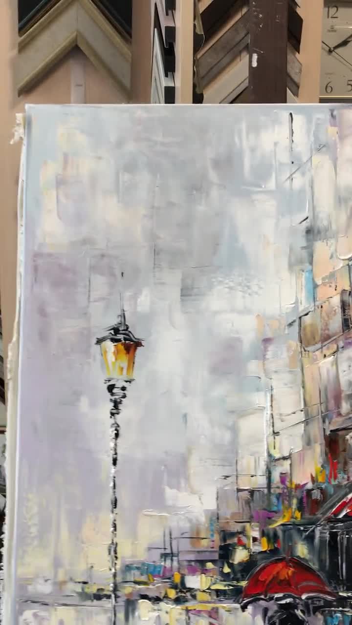 雨の降る街の風景を描いた油絵（オリジナル）、赤い傘を持った女性の