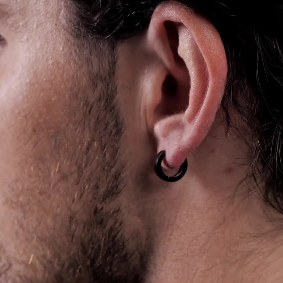 Male upper ear piercing