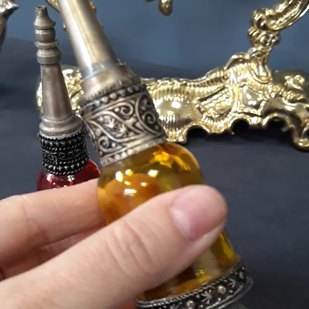 Moroccan Glass Perfume Bottle with Embossed Silvered Metal Design