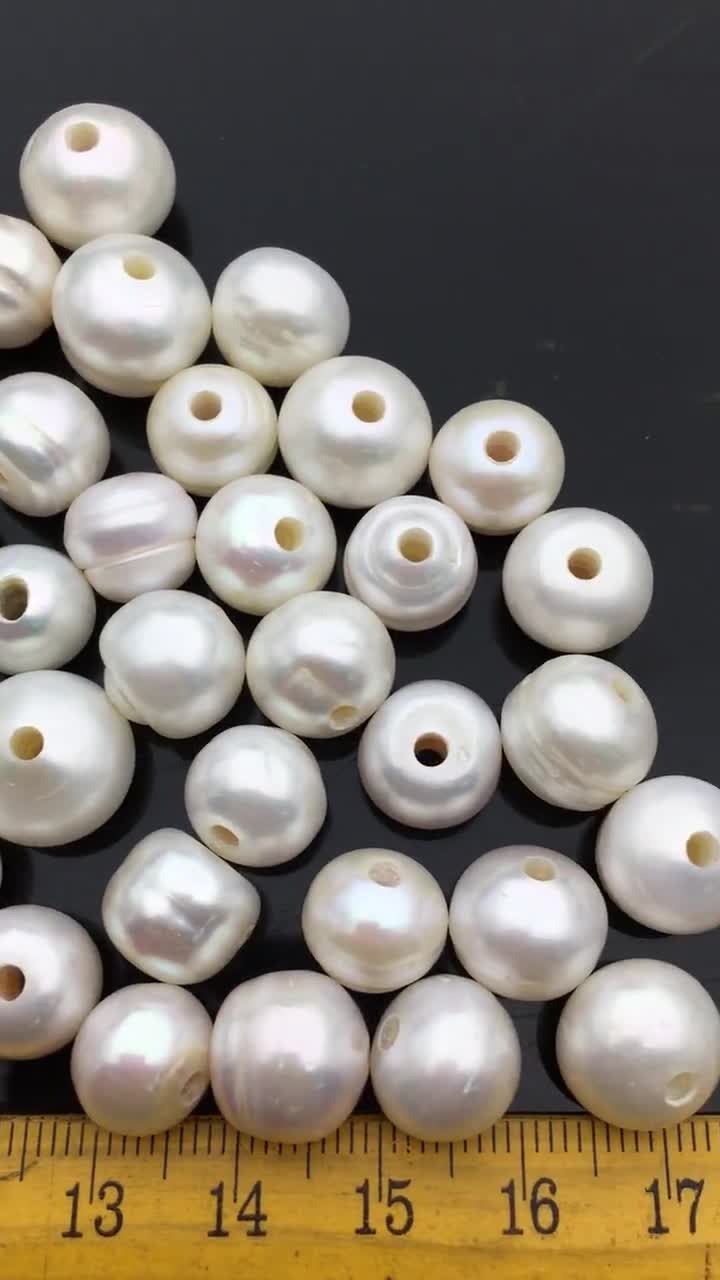 Peach Freshwater Pearl 10.5-11.5mm Smooth Round AAA Grade Pearl