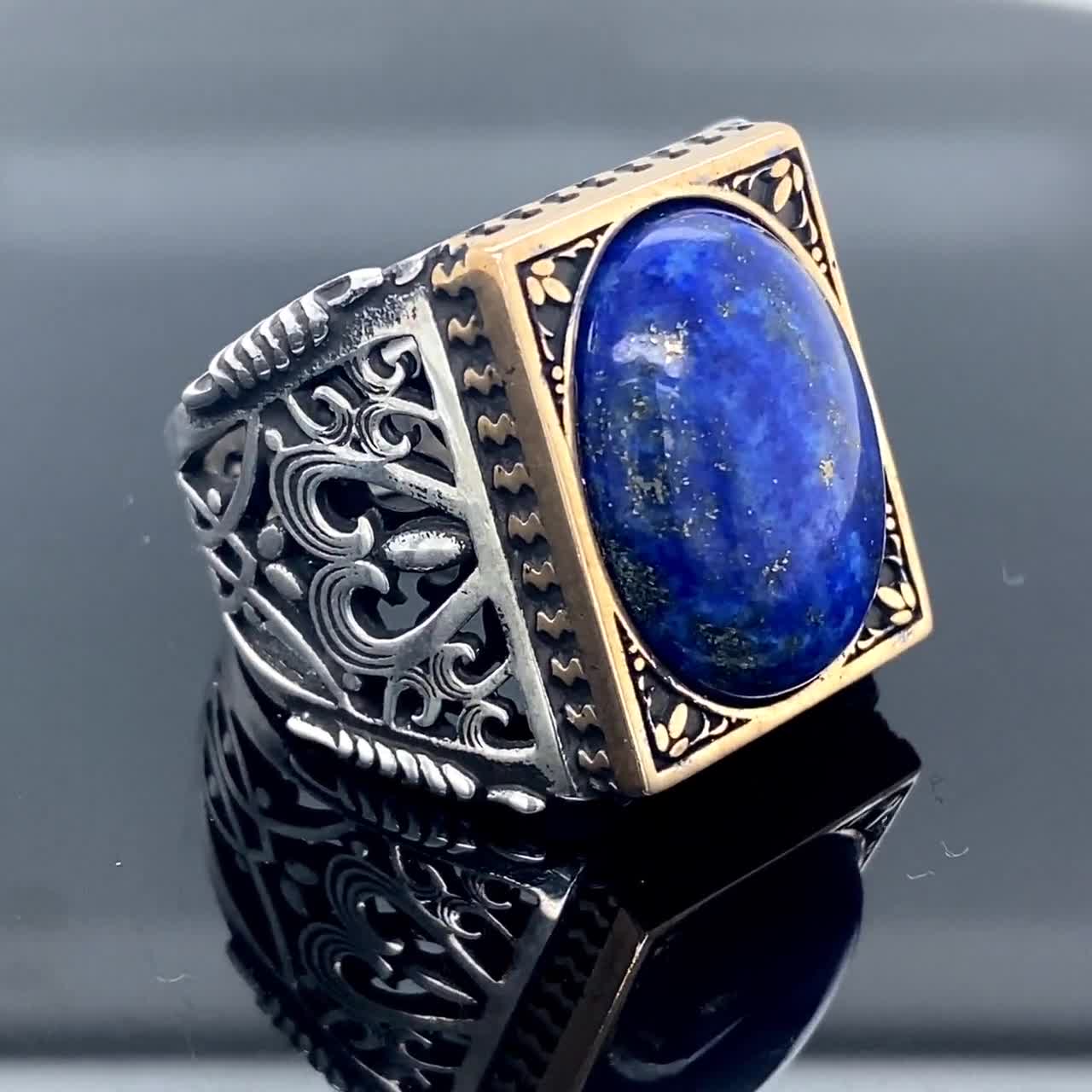 Big silver ring with lapis lazuli. Open ring with deep blue stone. One of sale a kind ring made with silver and blue stone, jagged detail.