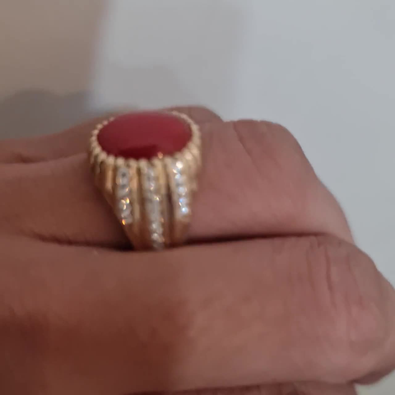 Sold at Auction: 12K gold & coral Gents ring with twisted rope design size  N, 7 gms
