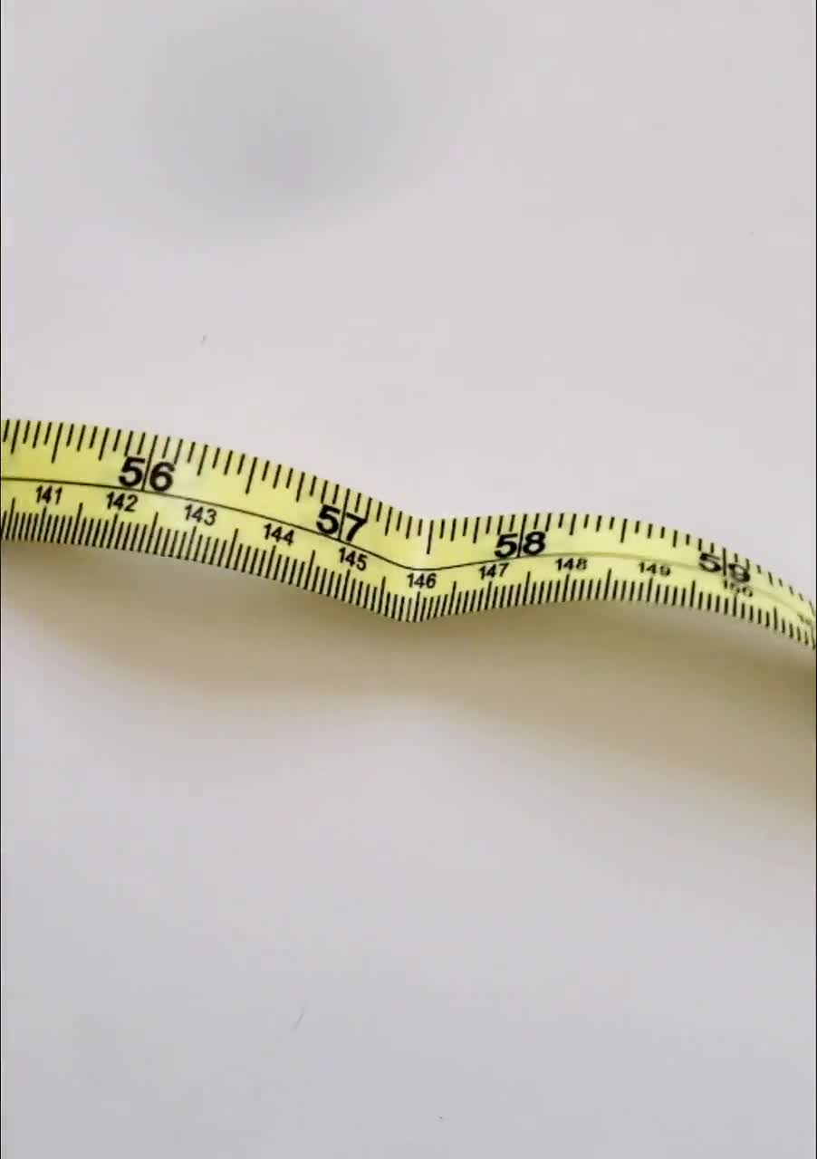 Professional Tailors Tape Measure with snap fastener. Sewing