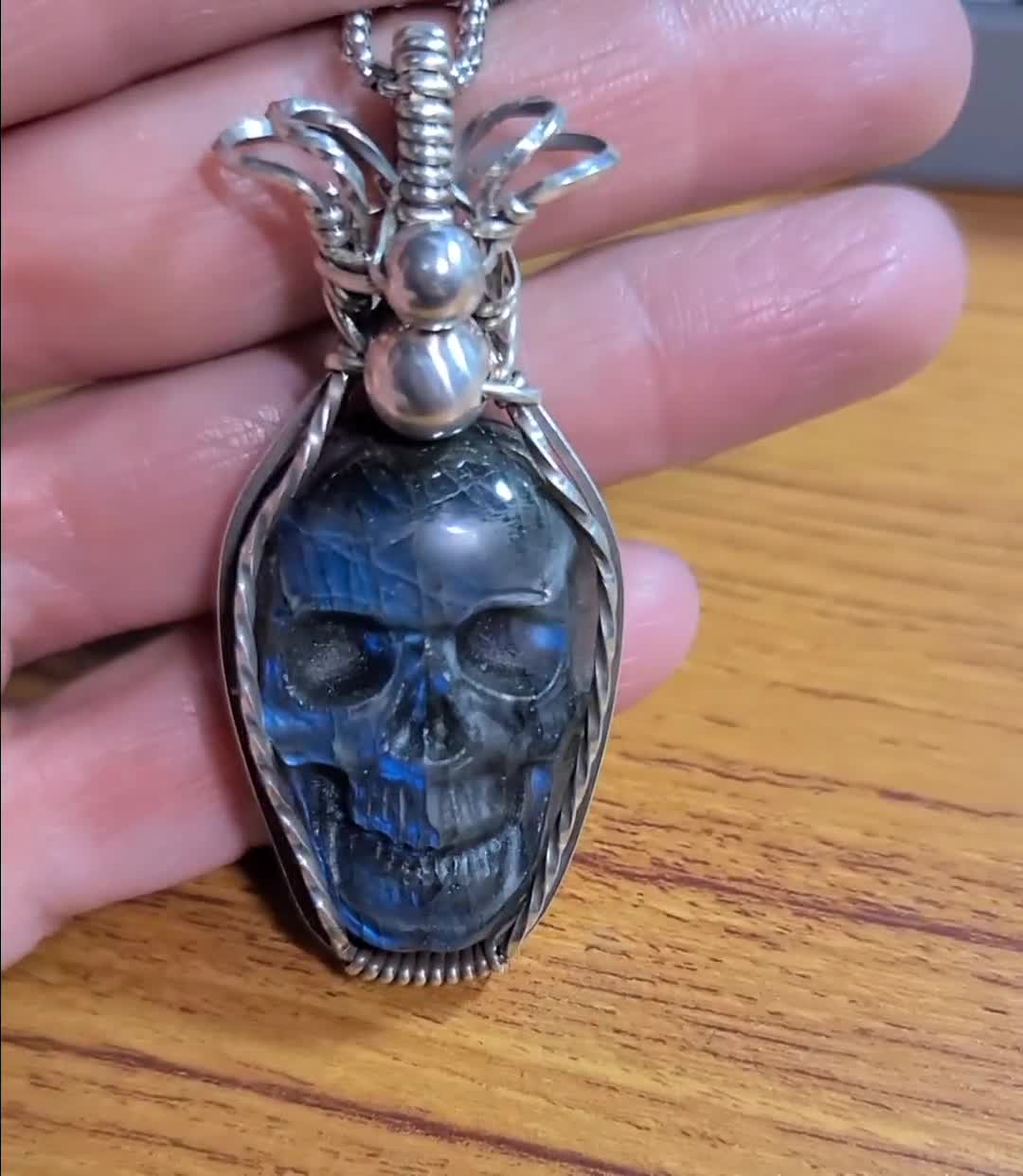 Blue labradorite skull pendant in solid sterling silver.