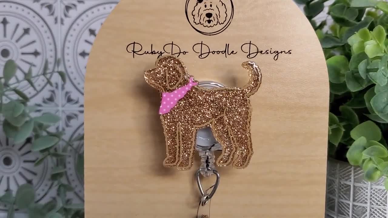Tan Rubydo Shaped Doodle Girl With Bow Badge Reel Goldendoodle