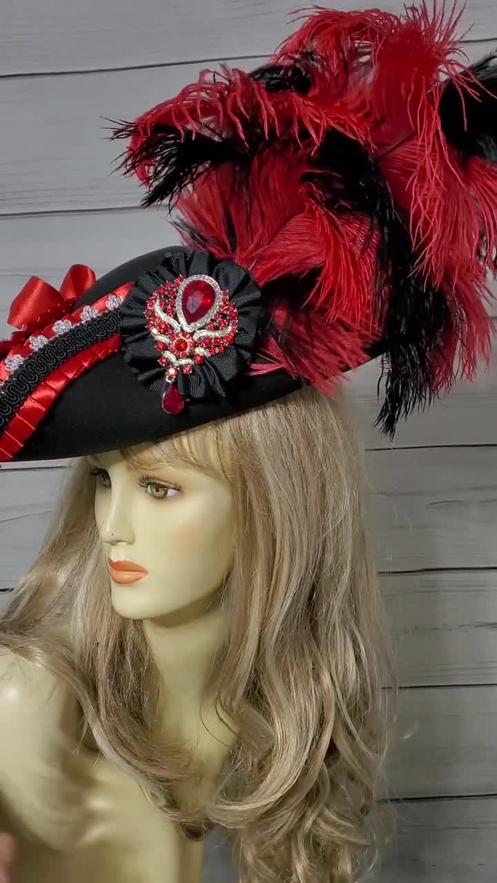 Sombrero pirata rojo con pluma adulto