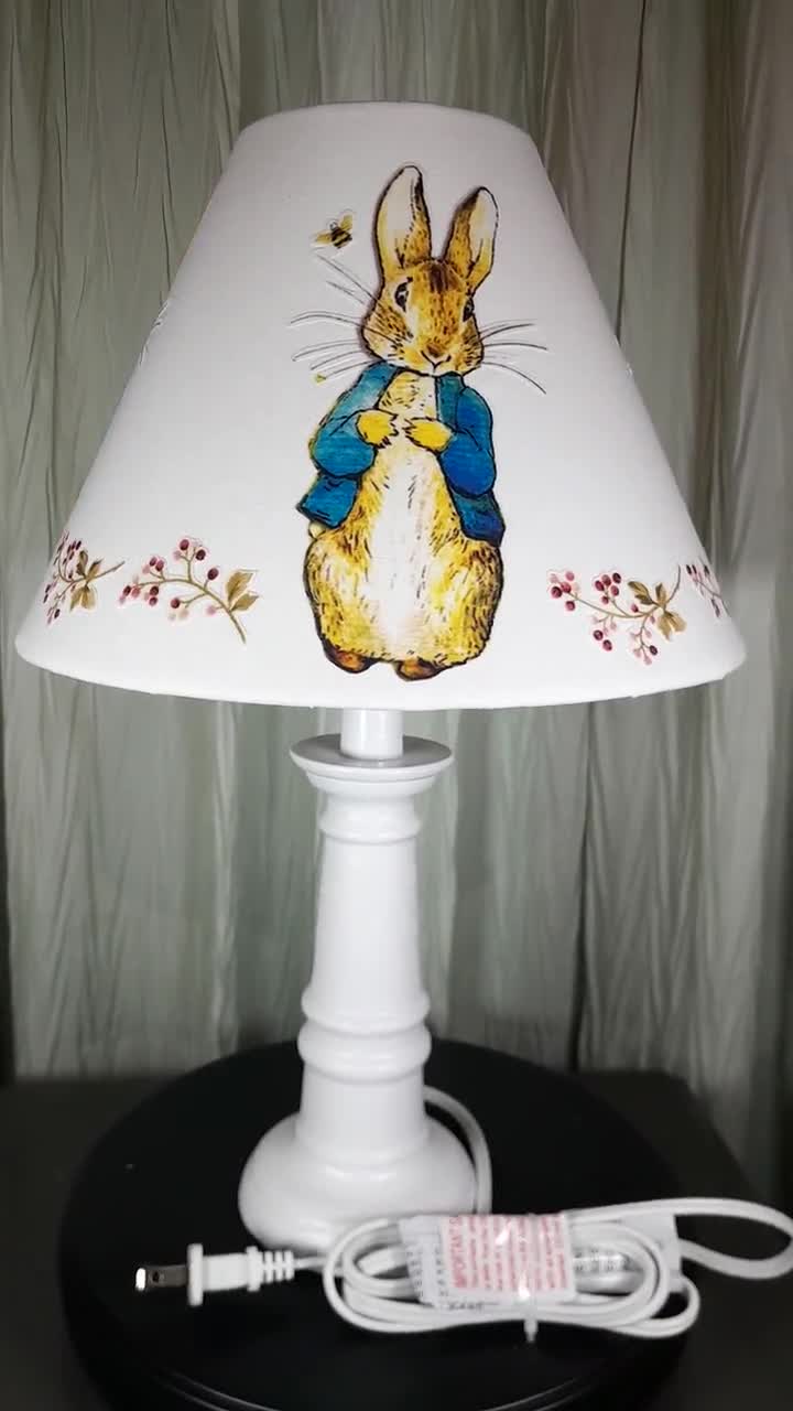 Peter Rabbit 2024 Nursery items: Vintage lamp, light switch cover, bookends plus