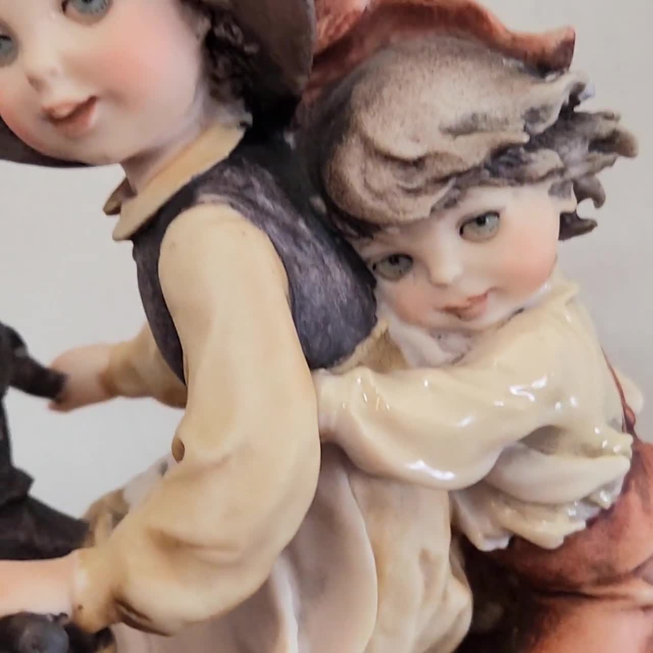 Vintage Giuseppe Armani Capodimonte Figurine: Kids on Tricycle