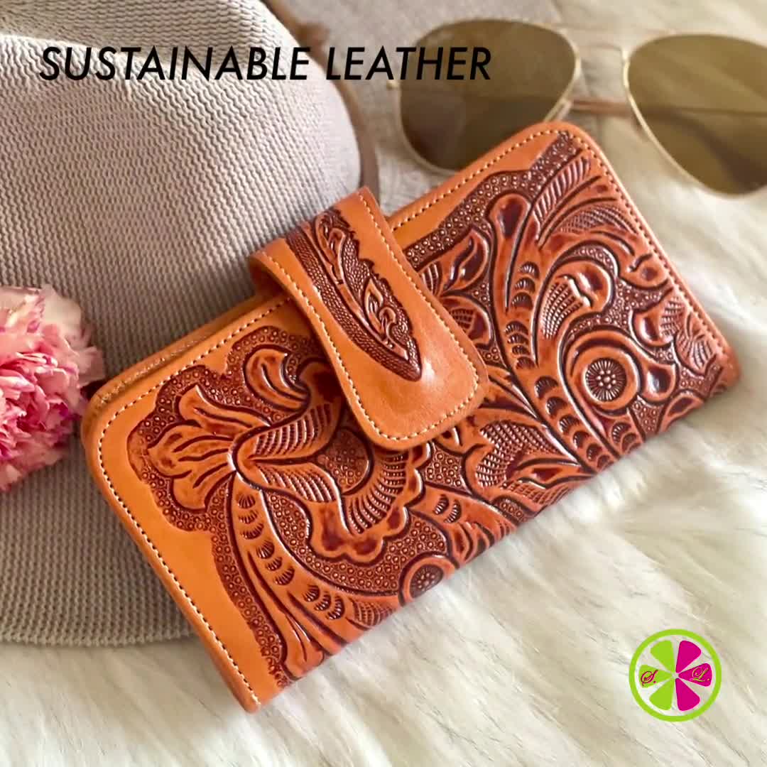 Leather wallet . ( 45 ) popular . Carved wallet . Tooled wallet . ( Rose design ) . Lady's wallet . Great gift . Canadian made .