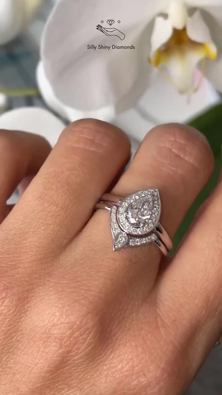 Third eye pear hot sale engagement ring