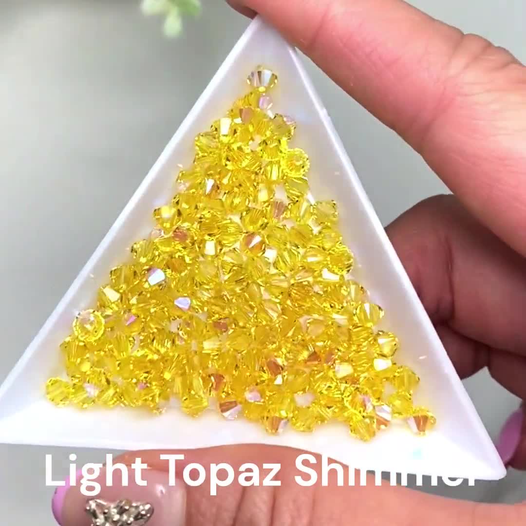 144個 - ライトトパーズシマー（226 SHIM）イエロー純正スワロフスキー