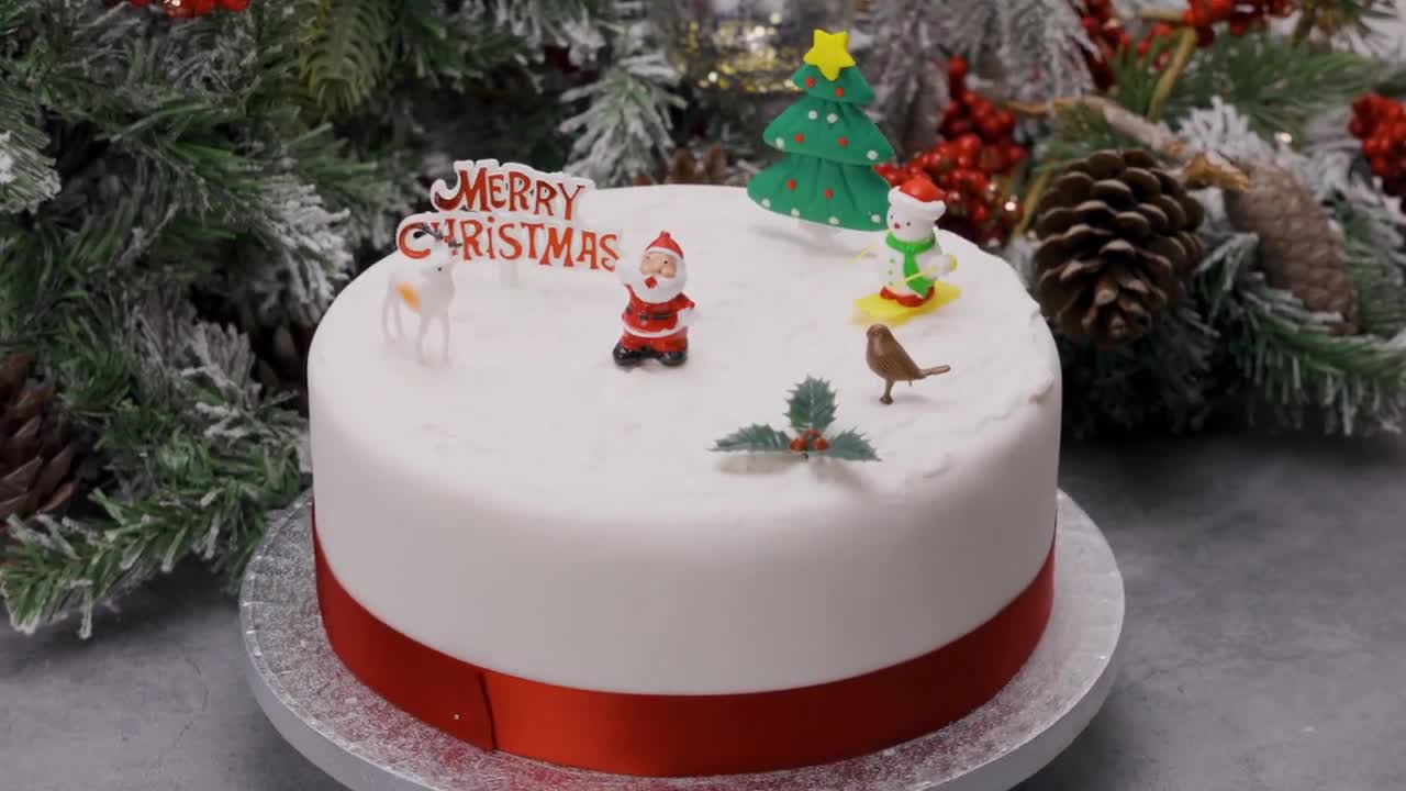 A Christmas tree cake with the baking … – License Images