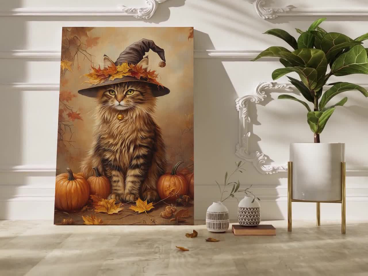 魔女の帽子をかぶった気まぐれな秋の猫とカボチャと落ち葉のキャンバス