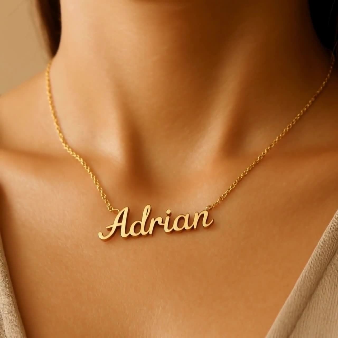 Personalized 14K Gold Nameplate Necklace in Elegant Cursive video poster