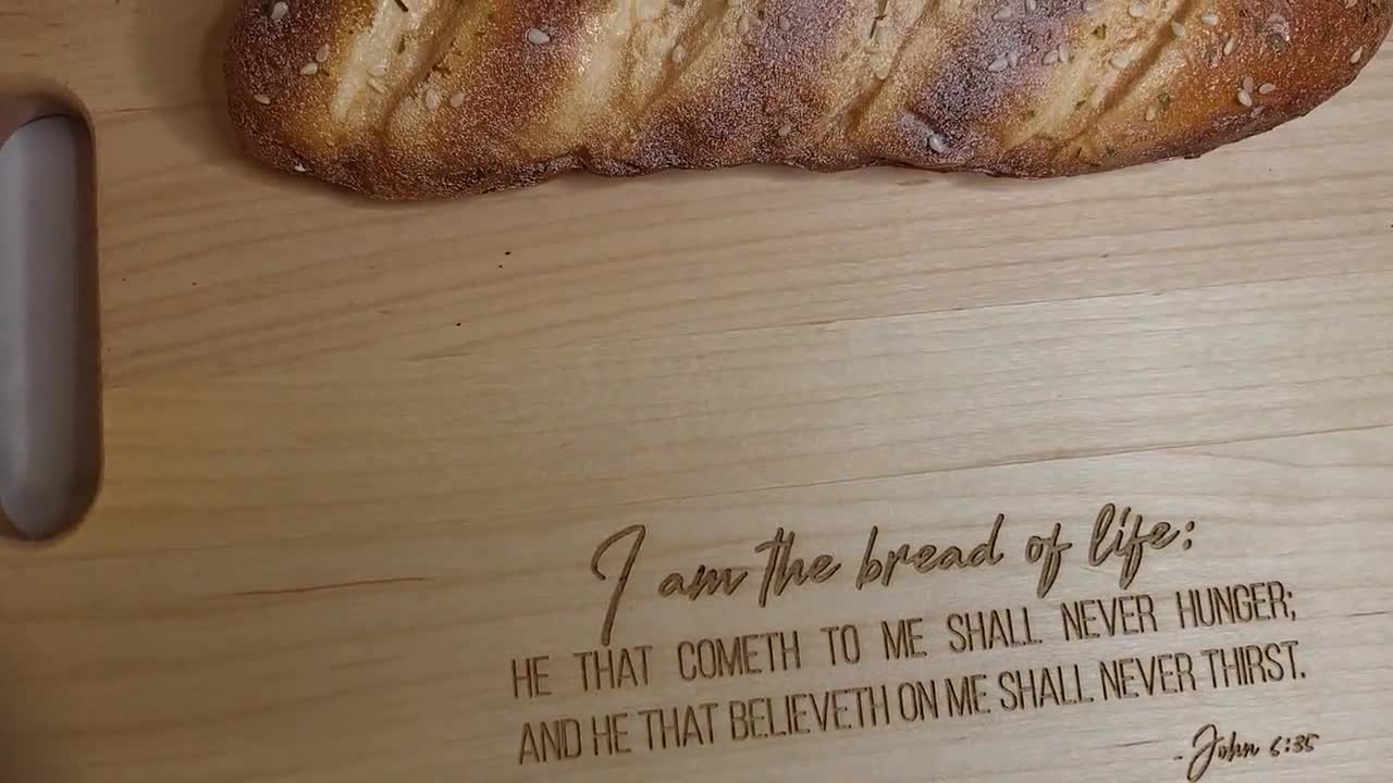 https://v.etsystatic.com/video/upload/q_auto/Bread_of_Life_Cutting_Board_rqzqka.jpg