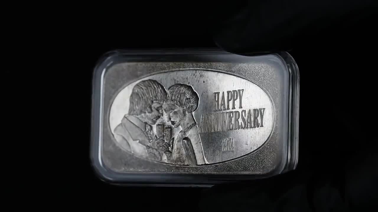 Happy Anniversary 1974 1 Troy Ounce .999+ Fine Silver Art Bar (Man & Woman  clinking wine glasses) USSC (United States Silver Corporation)
