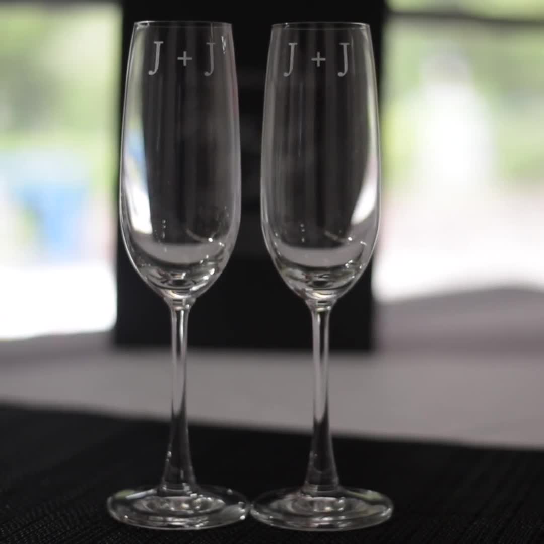 https://v.etsystatic.com/video/upload/q_auto/Engraved_Double_Champagne_Glass_Set_Engagement_with_Gift_Box_xa5q8u.jpg