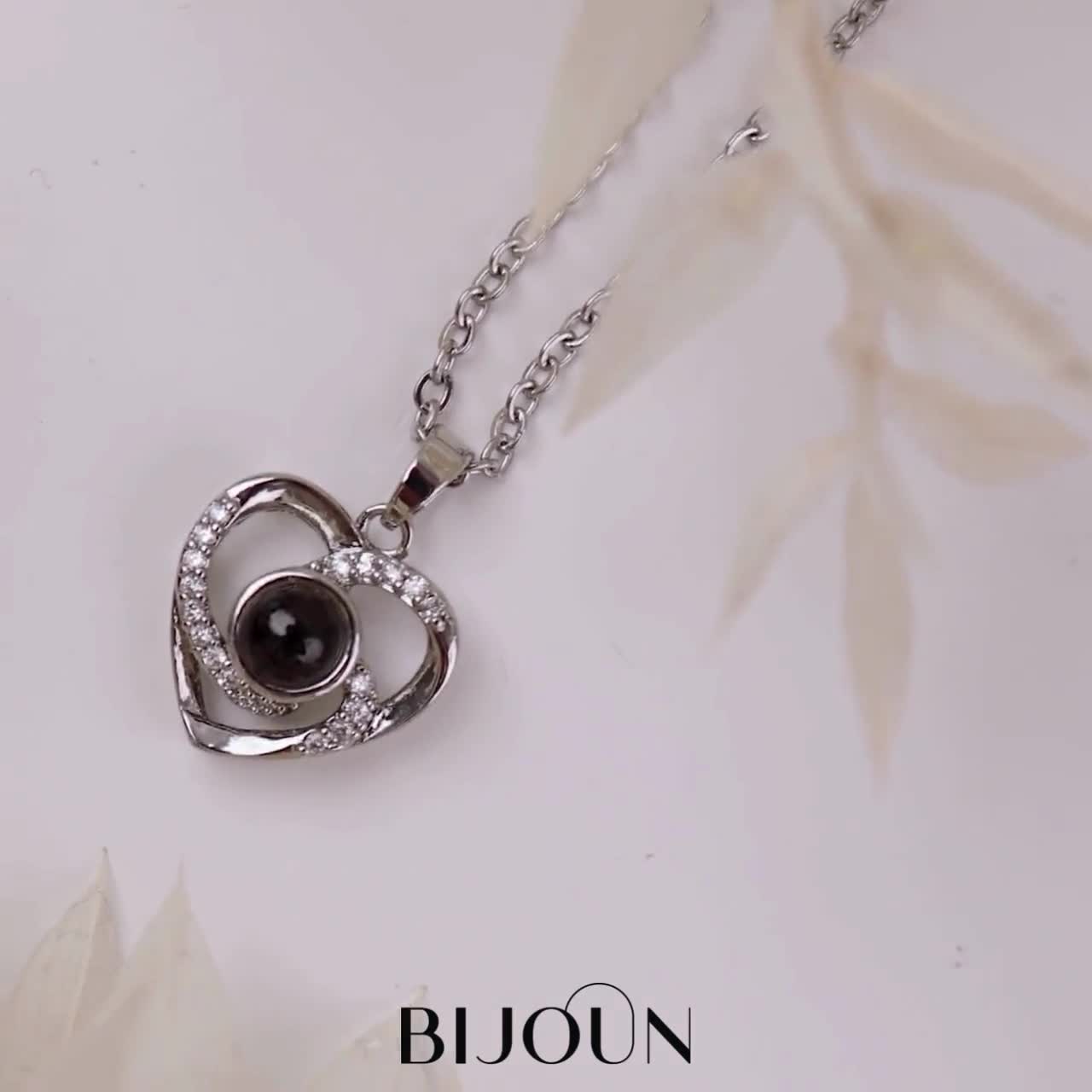 Heart stone projection necklace video nqliqq