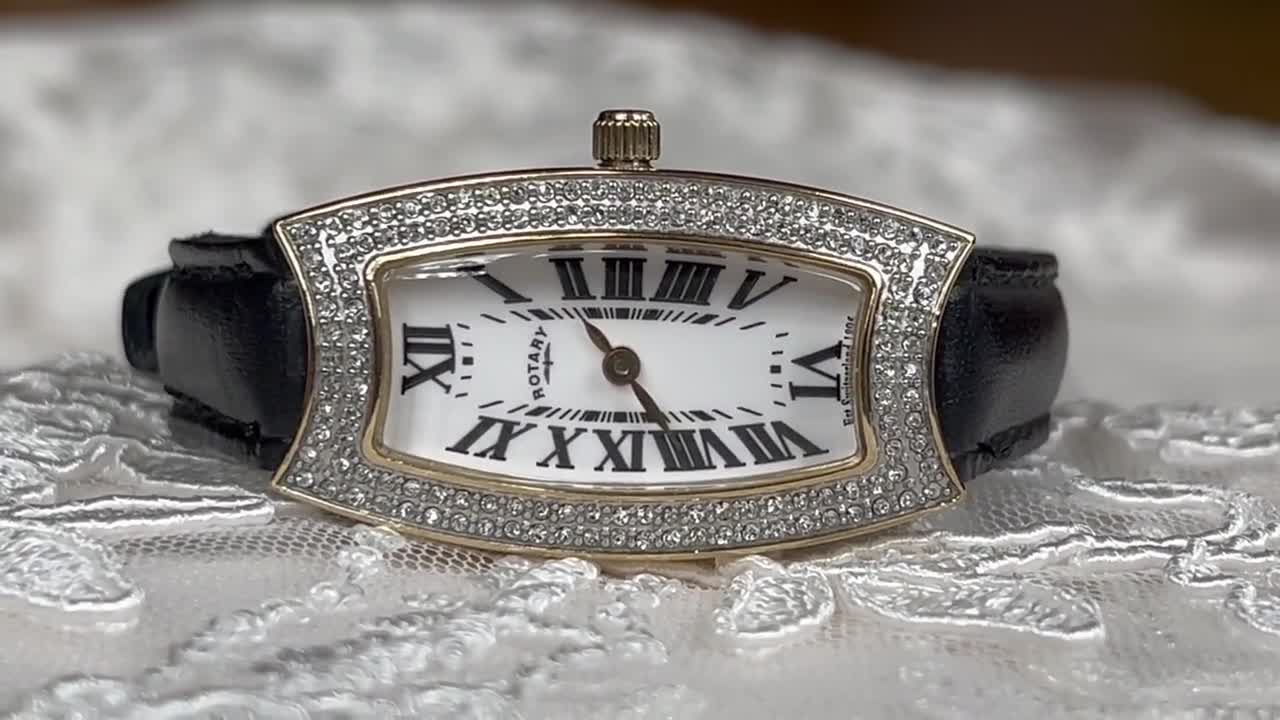 Elegant 1980's Vintage Swiss small quartz ladies dress watch Rotary golden tone case gemmed with zircons, Vintage women quartz watch.