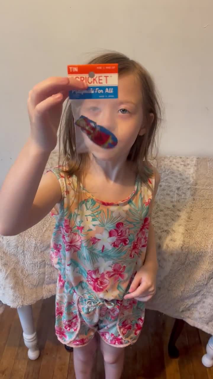 Vintage AIGAMI Japan Tin “Cricket” Clicker – Girl in Red Outfit – NOS Store Stock video poster