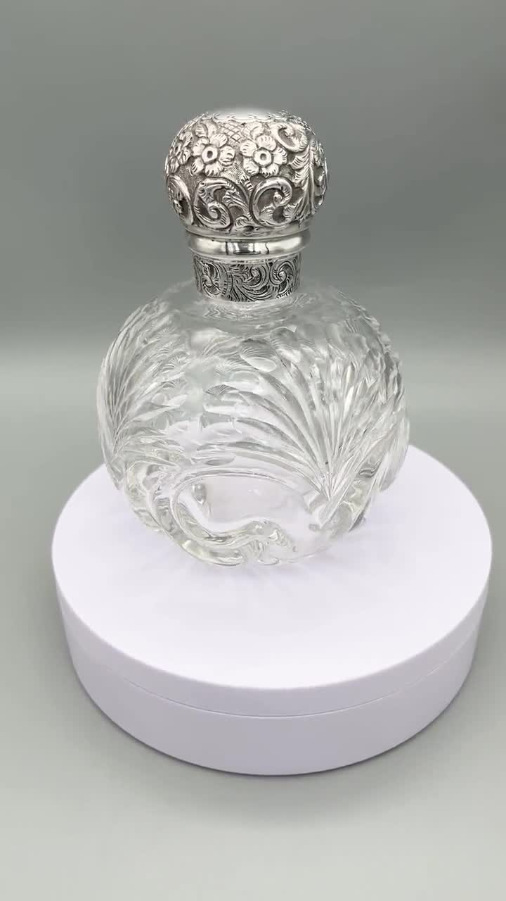 Crystal perfume bottle with hallmarked silver top, maker's mark by William on sale Vale & Sons