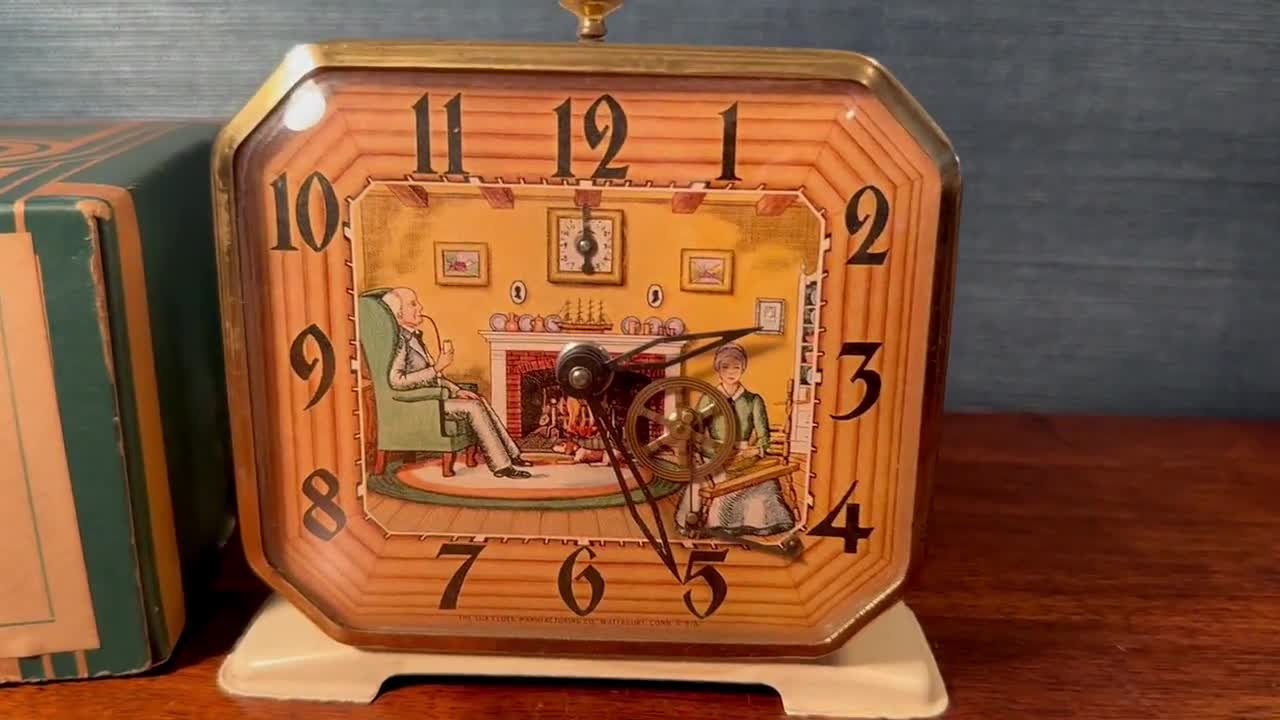 Vintage Lux Spinning Wheel Alarm Clock: 1930s Animated Americana