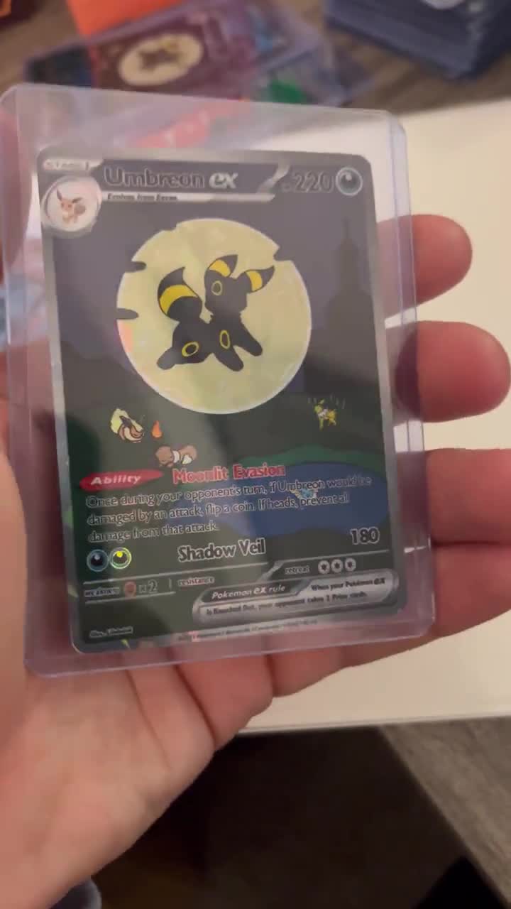 illustrator rarest pokemon card Amazon.com: Pokemon - Umbreon SWSH129 - Black Star Promo - Cosmic Holo