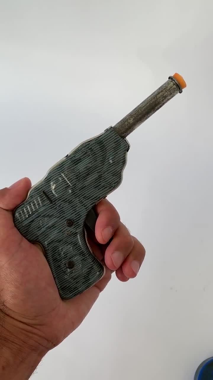 Ancien jouet pistolet EUREKA