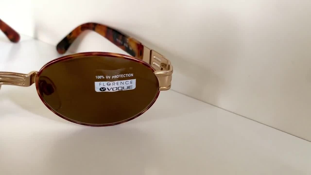 Occhiali da sole vintage ovali con montatura in marrone
