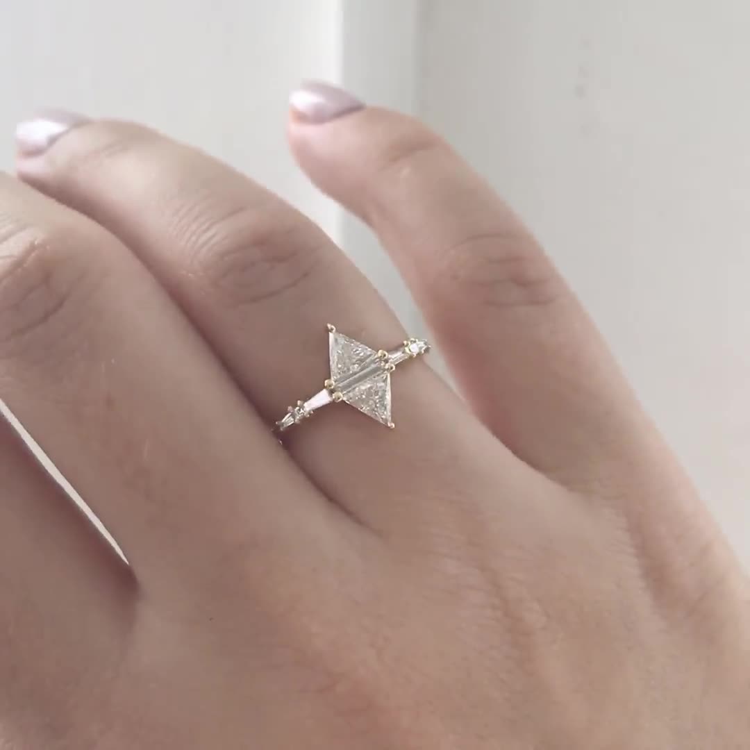 Floating Pear Cut Diamond Engagement Ring in A Classic Style