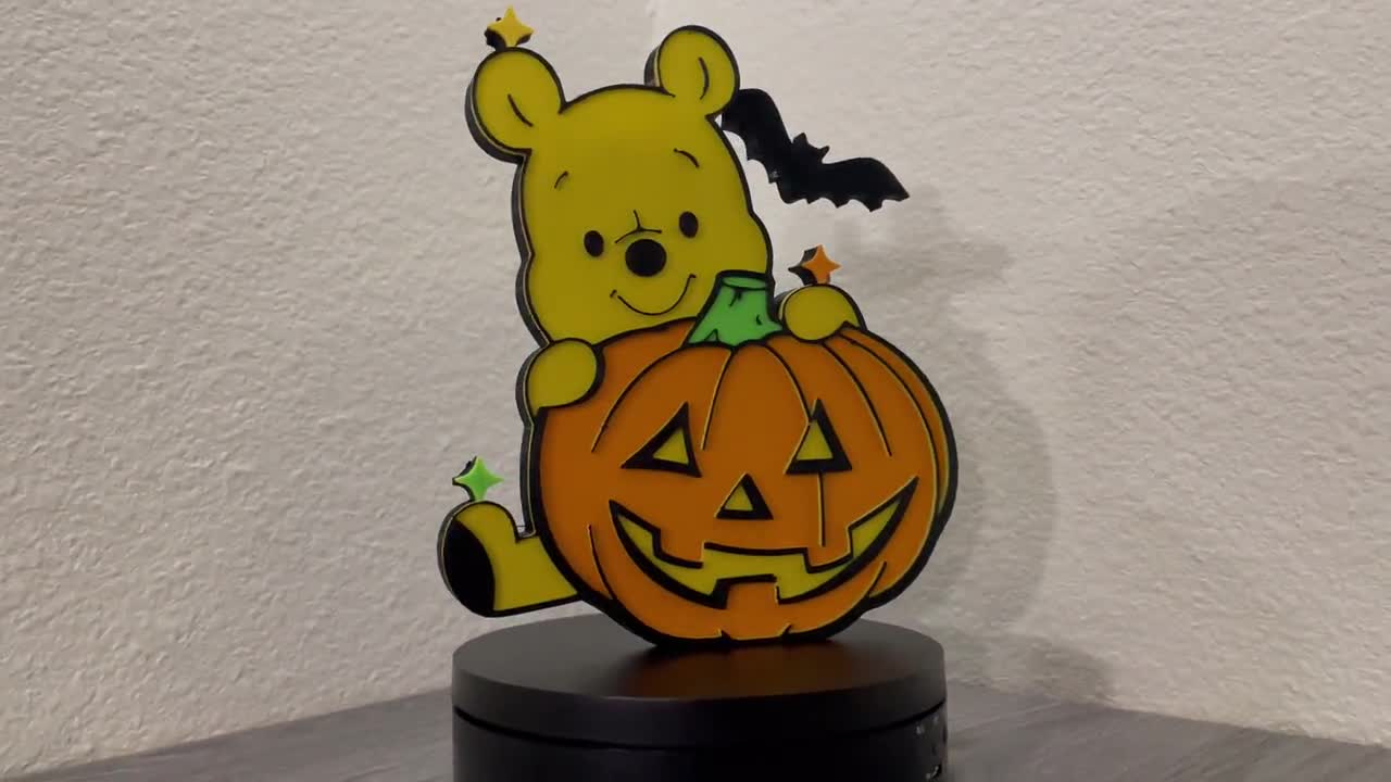 Winnie the Pooh honey pot made from a plastic jack-o-lantern