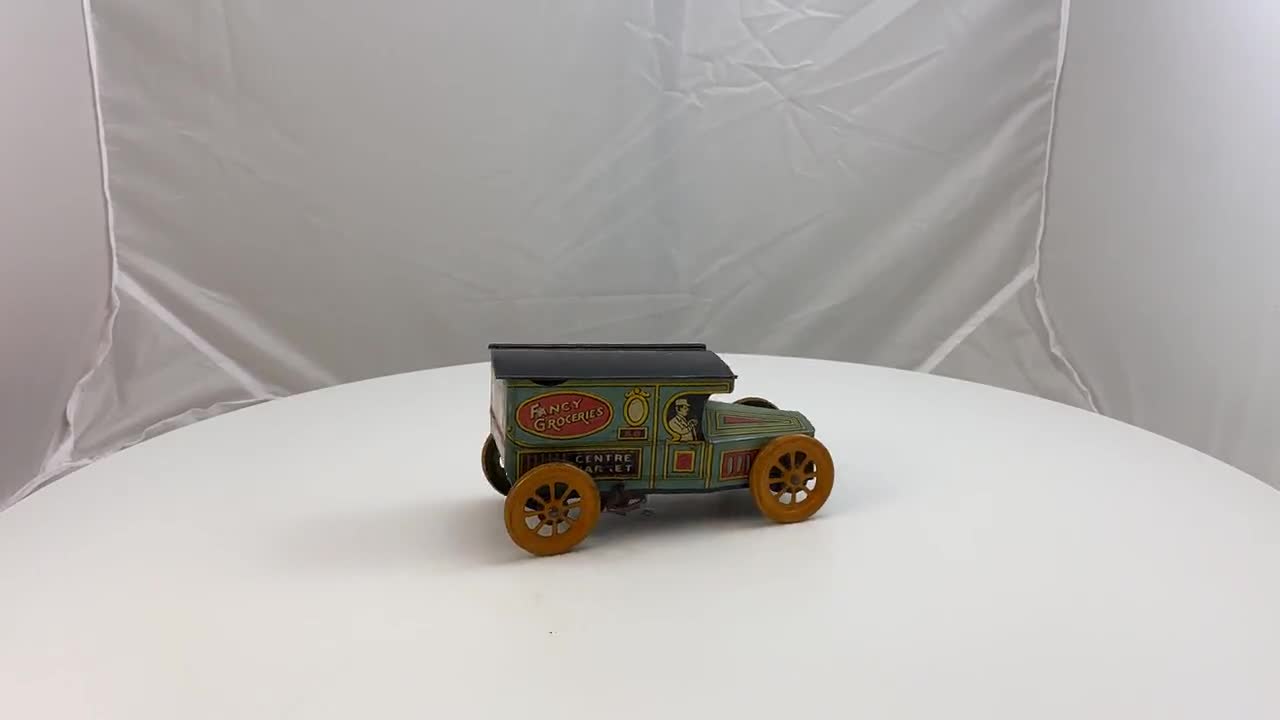 ヴィンテージ J. Chein ブリキ製ゼンマイ仕掛けの高級食料品おもちゃの