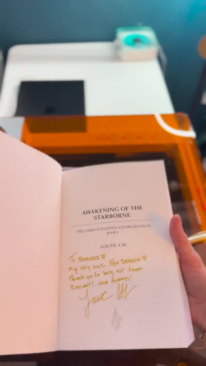 SIGNED Paperback of Awakening of the Starborne video poster