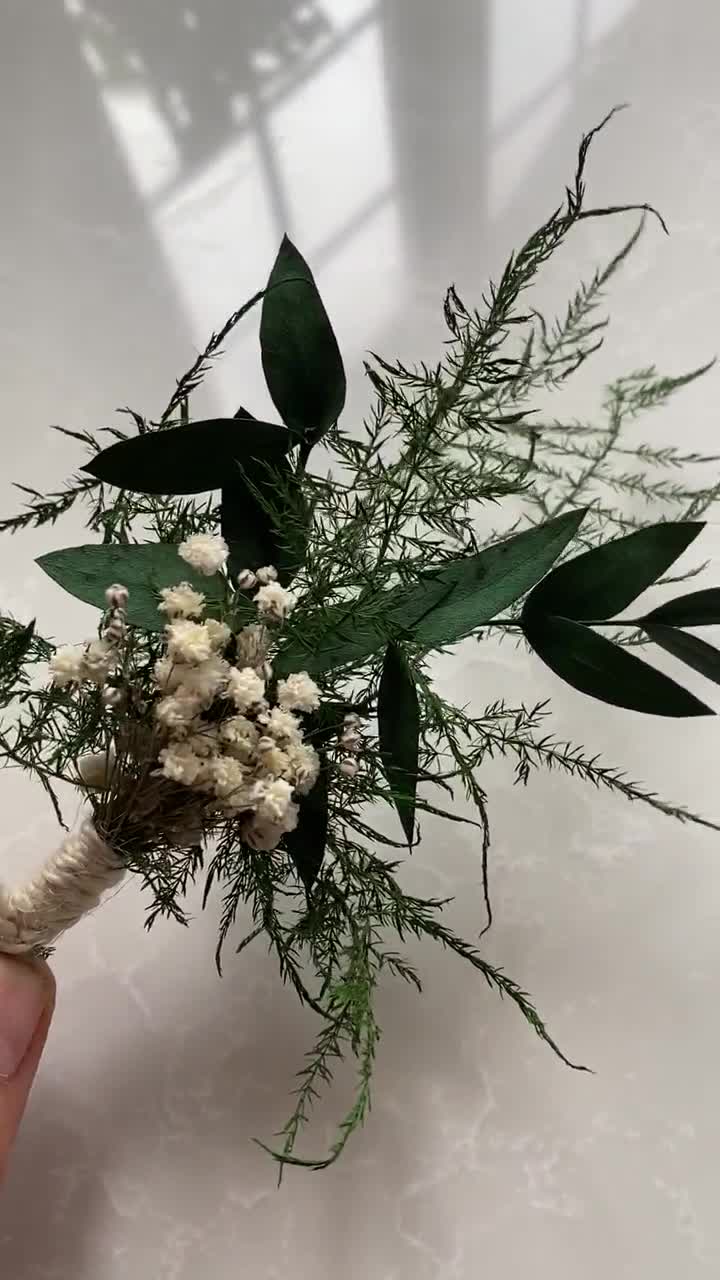 Boutonniere with magnets greens and babies breath in S. Tampa FL - Lavish  Blossoms