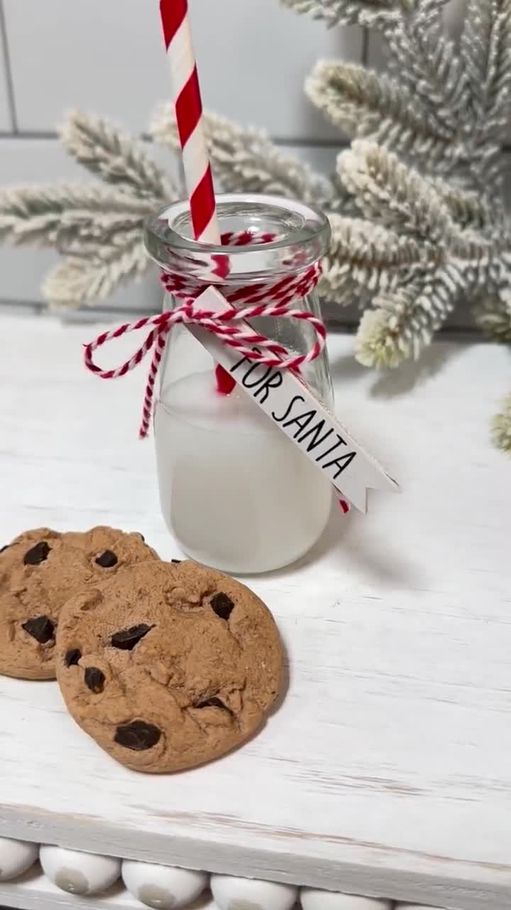 Christmas Milk For Santa In Bottle With Straw And Peppermint Candy