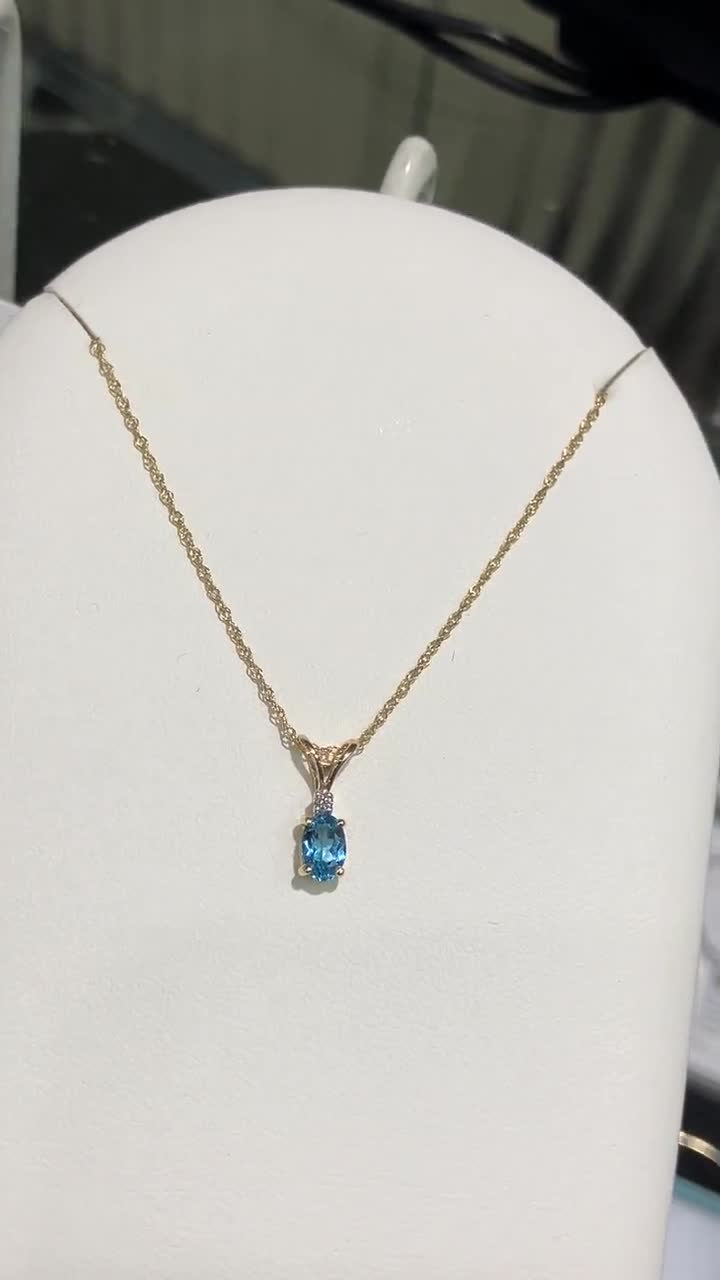 Topaz And Diamond Gold Necklace video poster