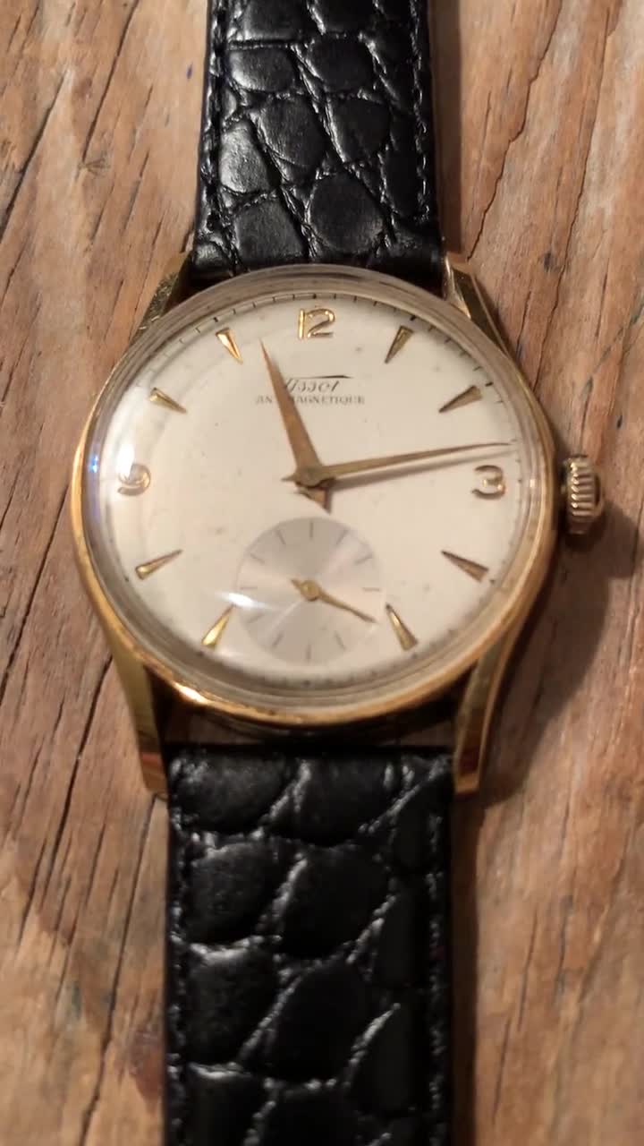 TISSOT FILS fully signed ca 50