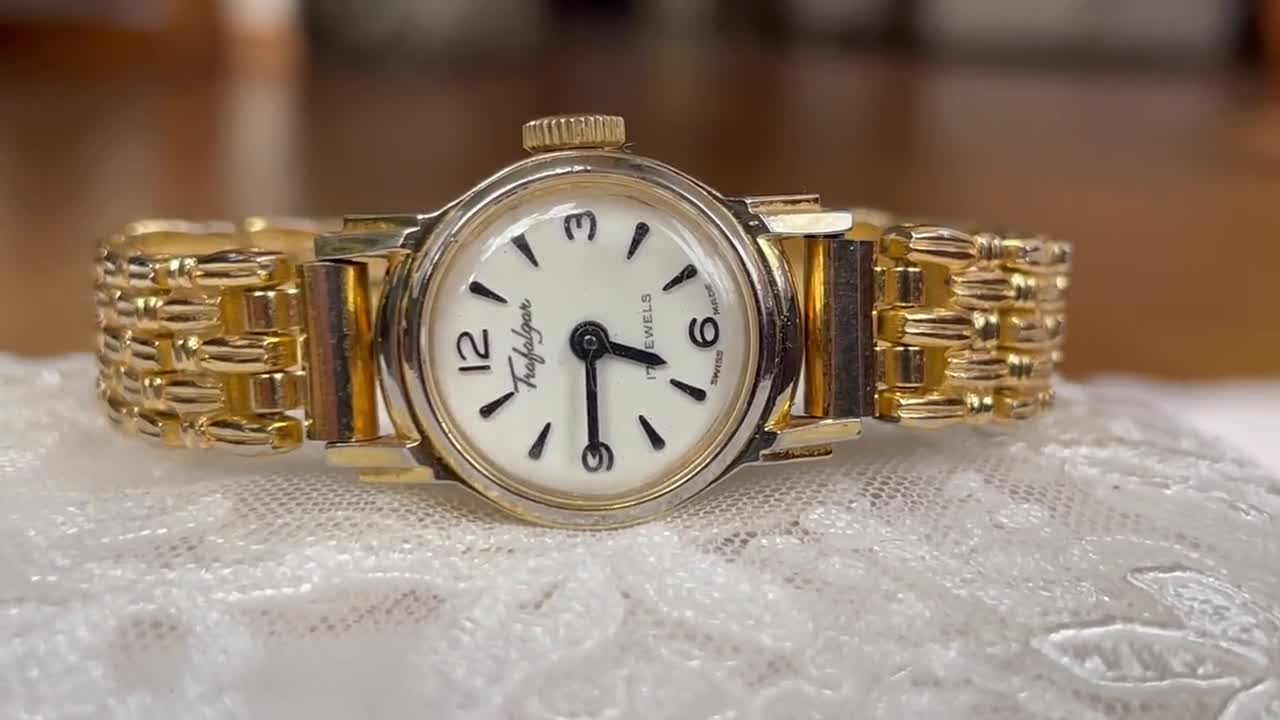 vintage ladies dress watch Caravelle by Bulova Vintage Dress Quartz Silver-Tone Dial Stainless Steel Watch 20mm