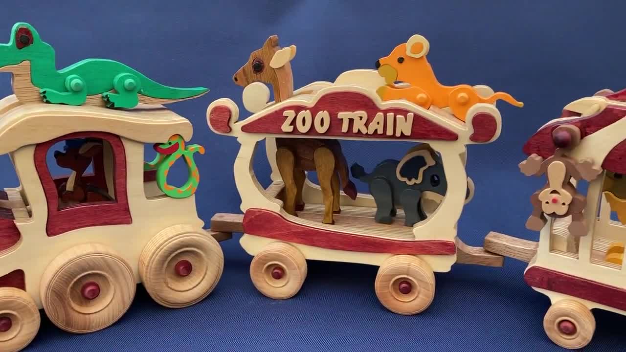 Colourful Wooden Zoo Train With Twelve Animal passengers - Etsy