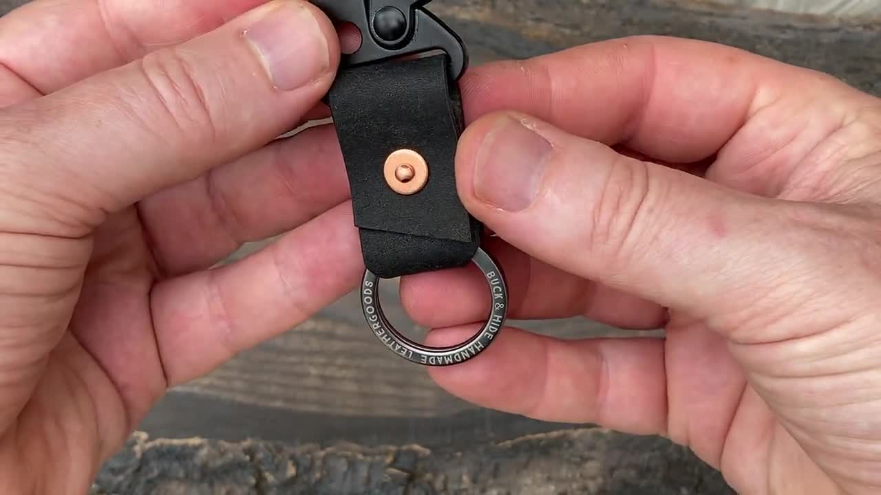 Black caribiner spring clip key fob, vegtan leather