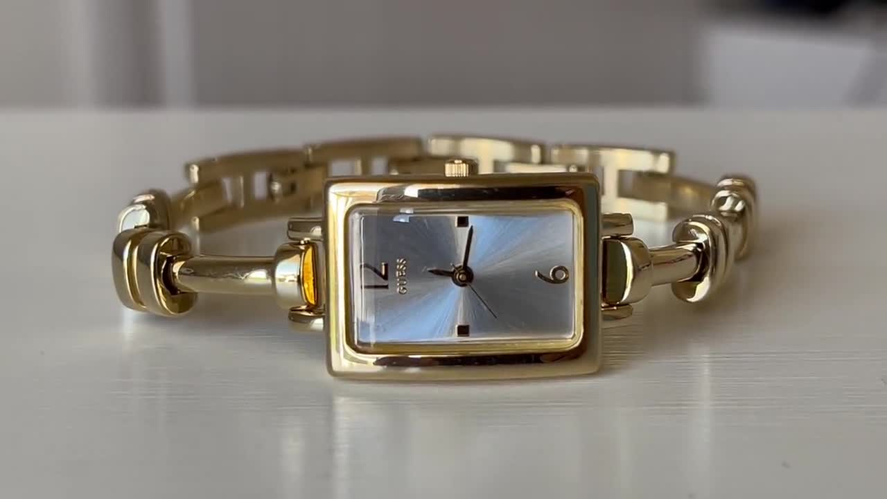 Elegant 1990s Vintage small quartz ladies tank dress watch Guess golden  color case, Vintage women cocktail quartz watch, Watch ladies gift