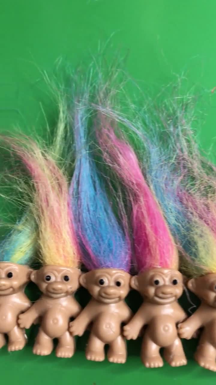 Little dolls store with colored hair