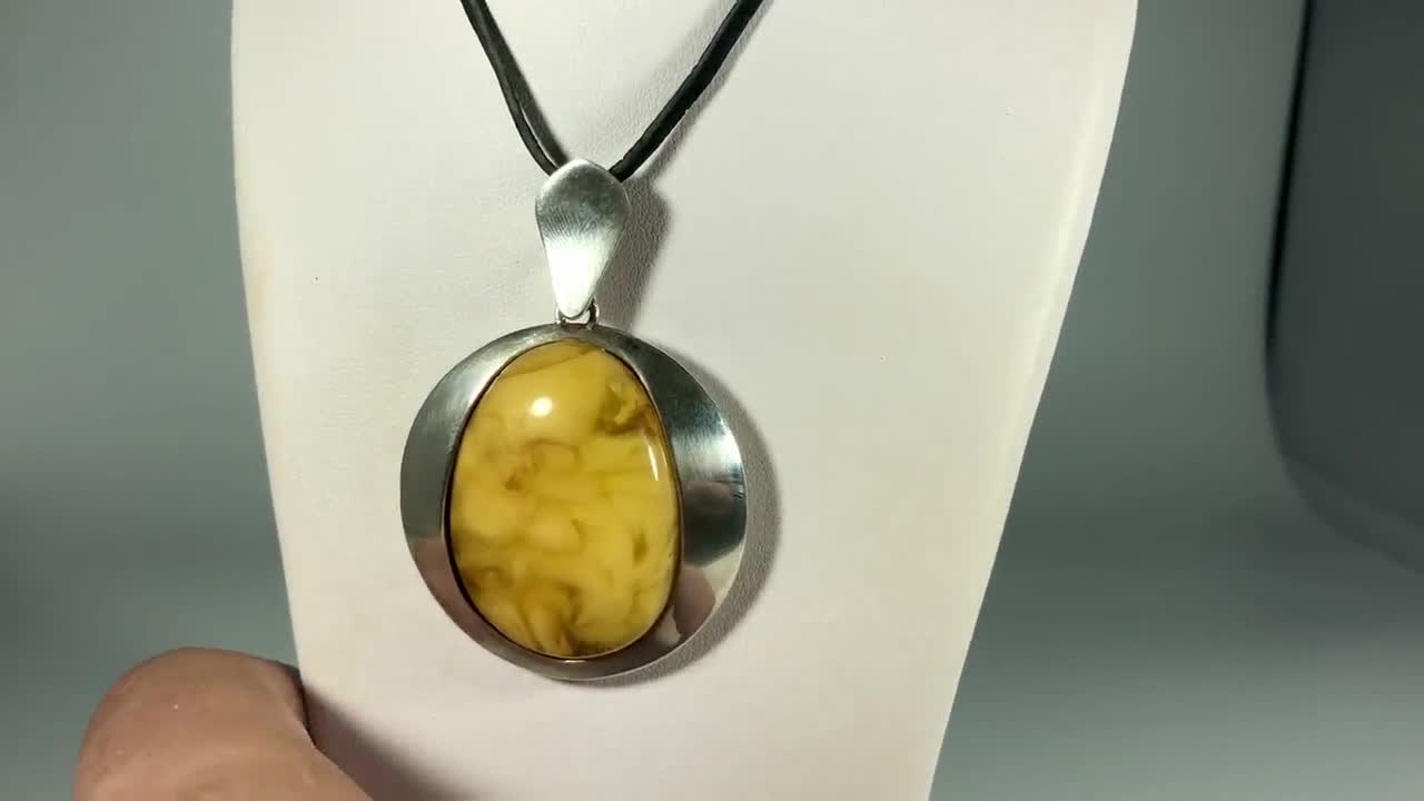 Handmade Butterscotch Baltic Amber Pendant: 925 Sterling Silver video poster