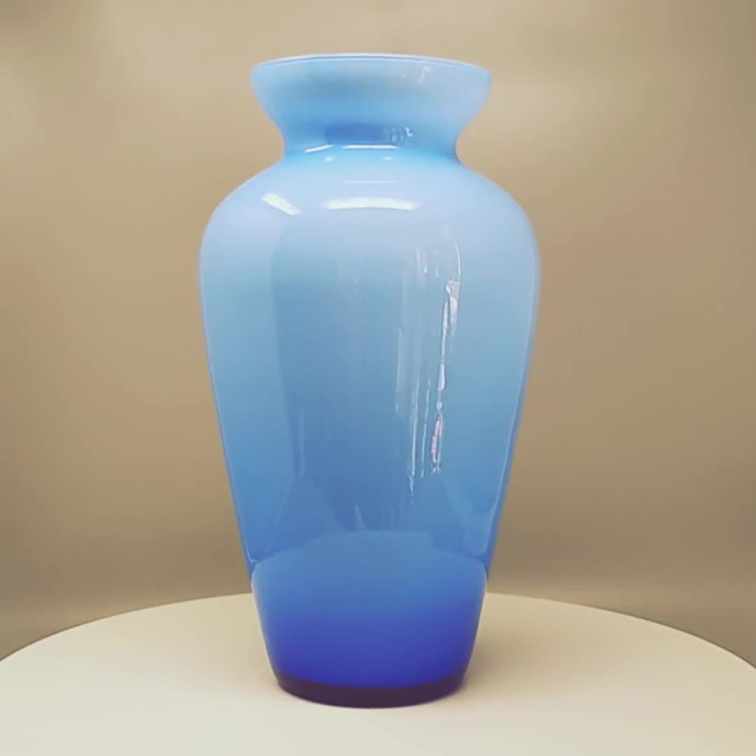 1960年代のムラーノガラス製の驚くべきブルーのジャケテッド花瓶