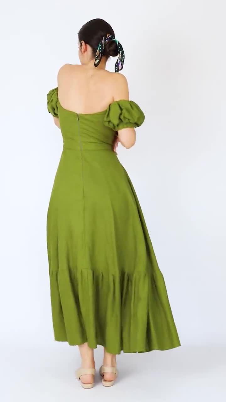COS - Green to be seen. Discover our sculpted midi dress, finished